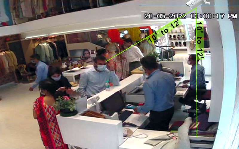 Place the camera diagonally at the billing counter for clear visibility of staff-customer engagement. 